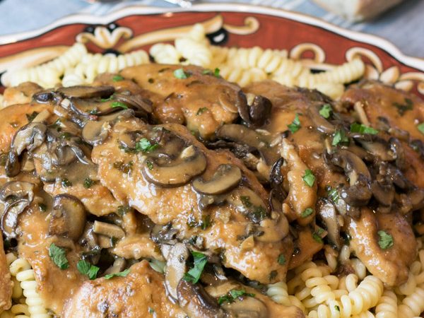 There are so many classic Italian dishes I grew up eating that are just so comforting to me- like this Classic Chicken Marsala. The chicken is so tender and that sauce is absolutely luscious with its rich flavors from the Marsala wine.